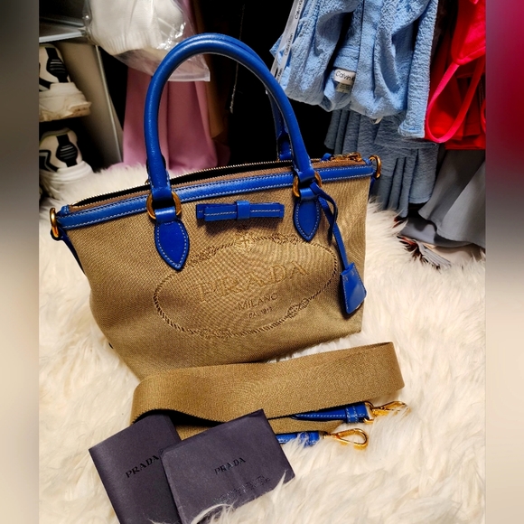 Prada Handbags - Prada authentic canvas bag w/Prada Azzure Blue leather trim.